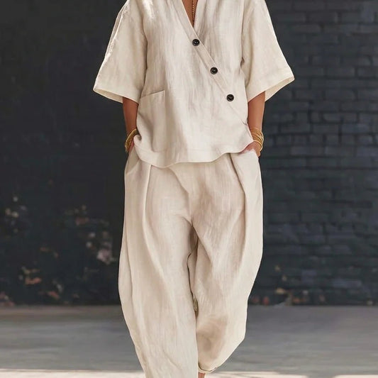 FitiqueFit V-neck short sleeve top with high-waist trousers two-piece set, featuring a stylish and comfortable matching outfit.