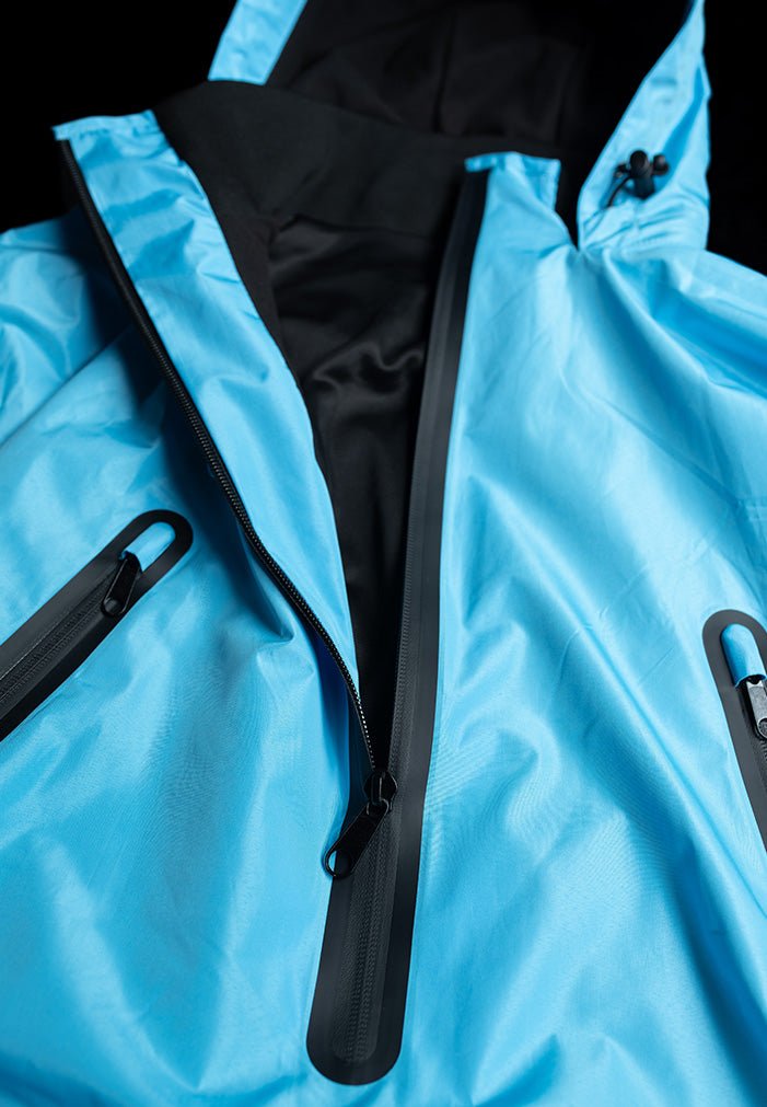 IWOM WeatherShield Convertible Jacket displayed on a hanger, showing its versatile design and weather-resistant fabric.