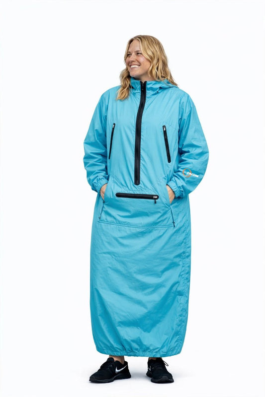 IWOM WeatherShield Convertible Jacket shown in black, featuring a hood, zipper front, and adjustable cuffs for versatile weather protection.