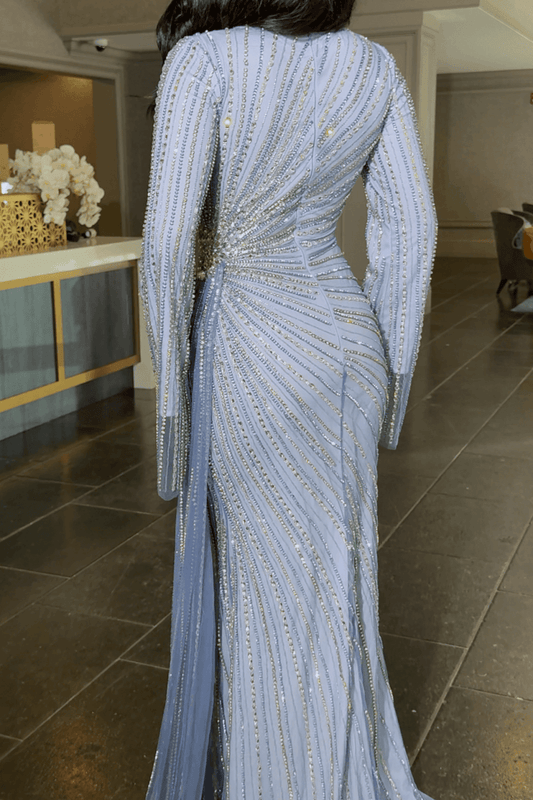 Iyza Belaar Abira sequin embellished modest long sleeve dress with neckline and side skirt for elegant occasions.