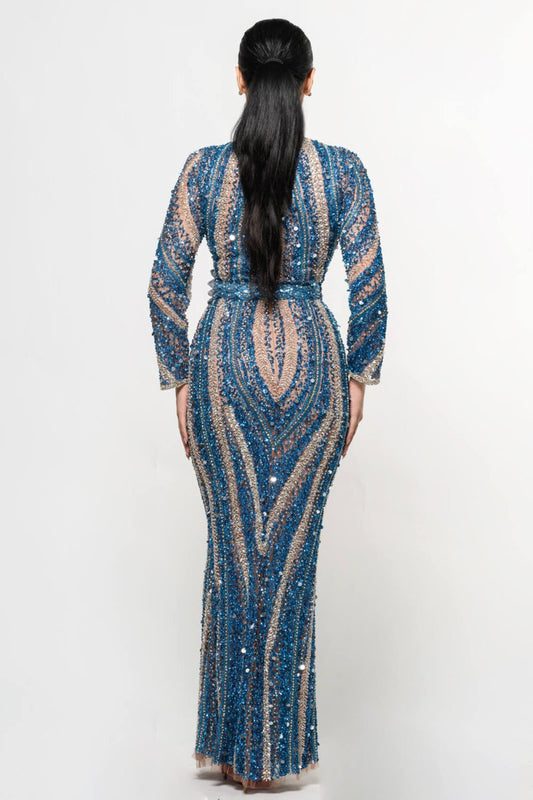 Iyza Belaar Mariam long sleeve beaded dress with intricate beadwork, elegant neckline, and flowing fabric for formal occasions.
