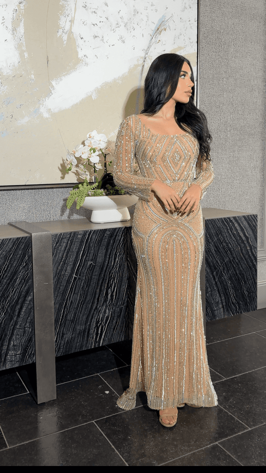 Iyza Belaar Reema Sequin modest long sleeve dress with square neckline and embellished design, perfect for elegant occasions.