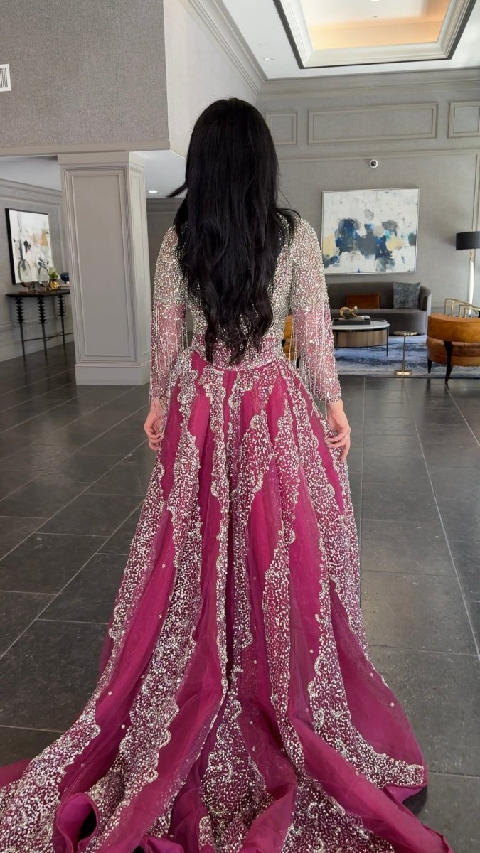 Iyza Belaar Aleya beaded detachable embellished sequin overskirt, long dress accessory, detailed beadwork and shimmering sequins visible.