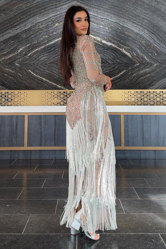 Iyza Belaar Dalia long sleeve beaded sequin modest tassel gown, elegant full-length dress with intricate beadwork and tassel details.