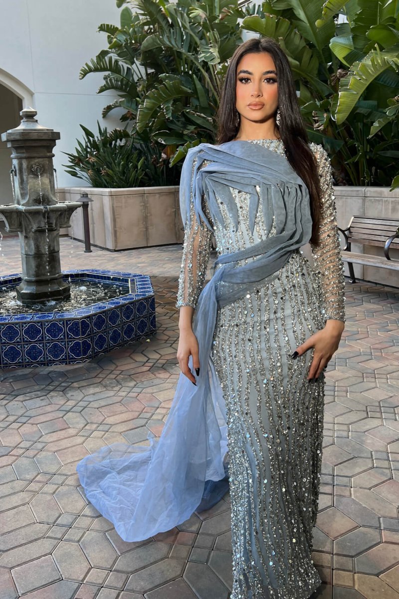 Iyza Belaar Imani long sleeve side skirt dress, a stylish long dress featuring elegant design and side skirt detail.
