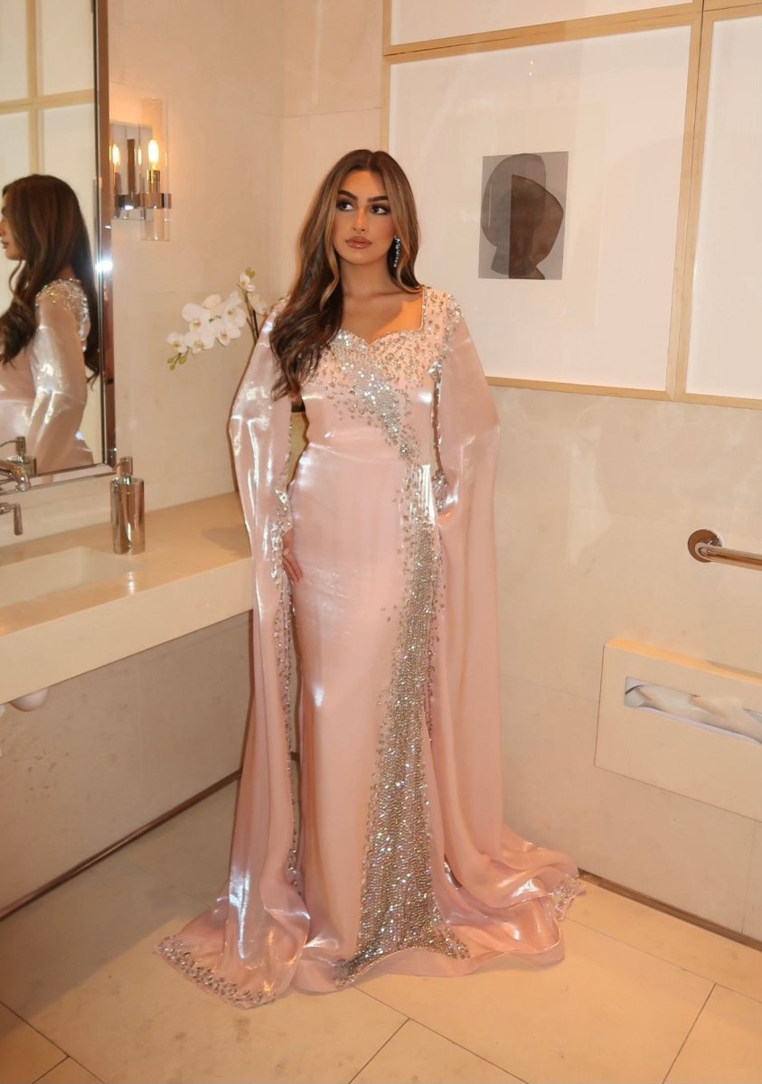 Iyza Belaar Munira long sleeve organza drape modest dress, flowing long dress with elegant sheer sleeves and a modest design.