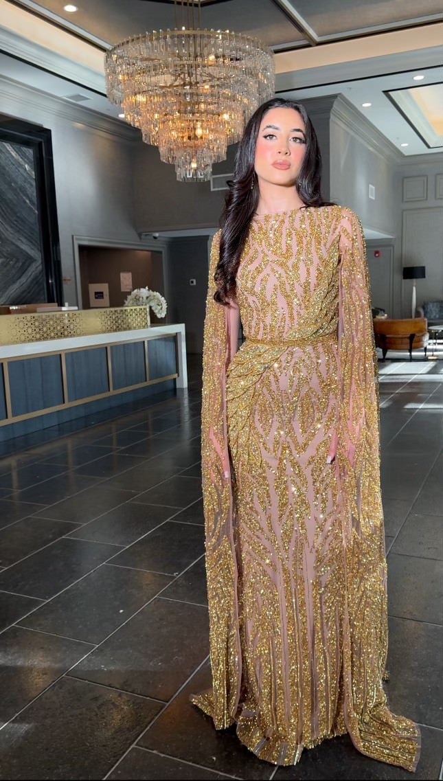 Iyza Belaar Nabilah embellished long dress with cape sleeves, featuring intricate details and elegant design.