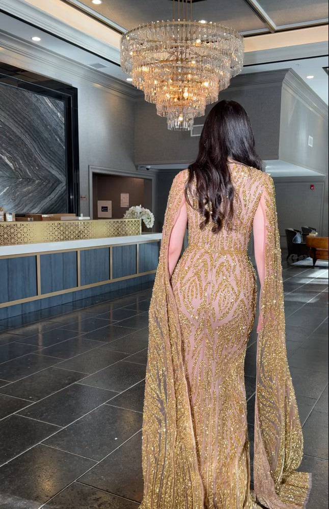 Iyza Belaar Nabilah Embellished Cape Sleeve Long Dress, elegant evening gown with intricate embellishments and cape sleeves.