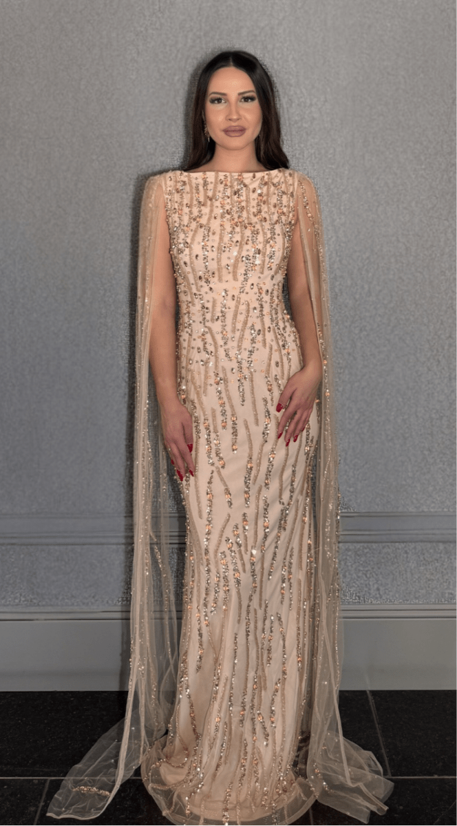 Iyza Belaar Faramah long evening dress with embellished drape sleeves, fitted silhouette, sequins, and modest design.