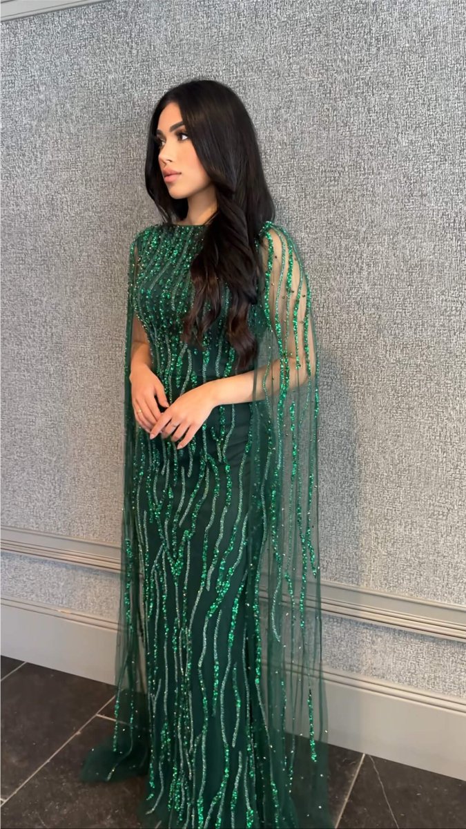 Elegant Faramah Drape Sleeves embellished fitted sequin evening dress by Iyza Belaar, featuring a modest long dress design.