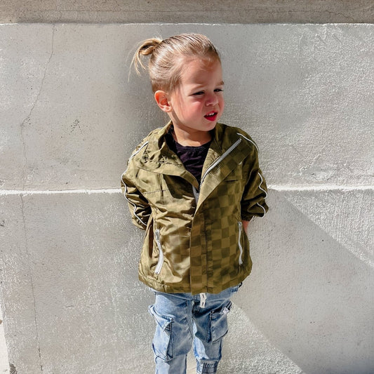 Little Rad Things Storm Rider waterproof jacket in army green, showing the durable, waterproof fabric and adjustable hood.