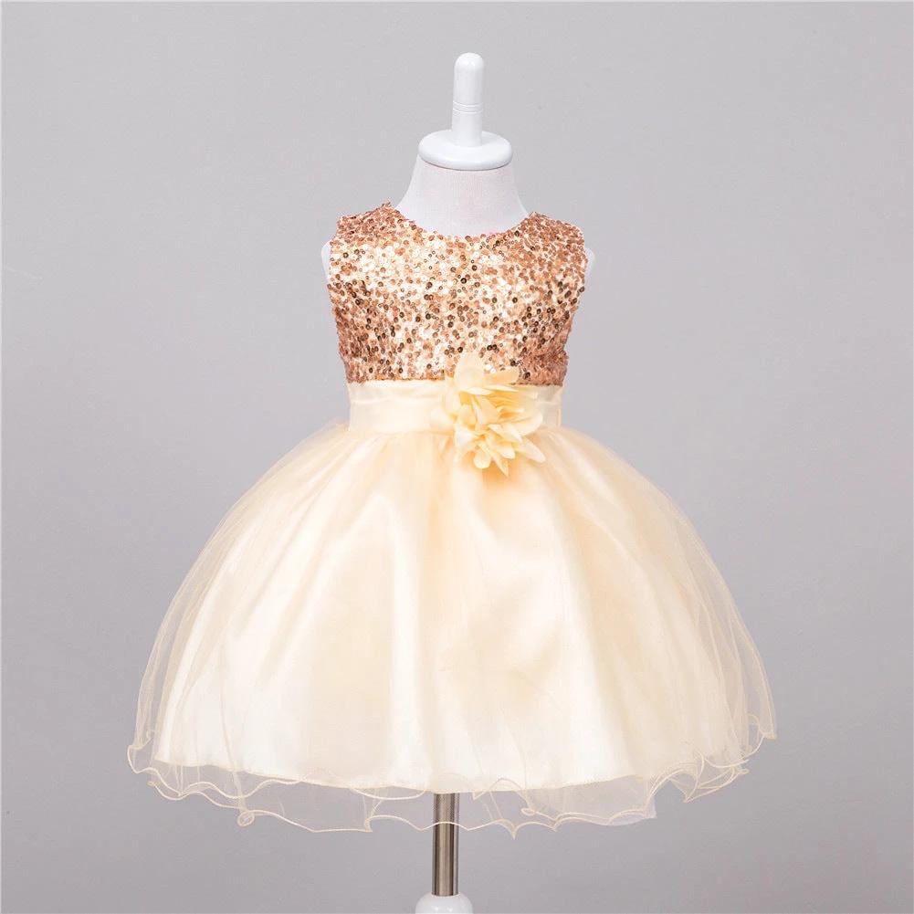 Baby sequin dress by MANDOTOS with flower girl design, perfect for wedding princess attire, featuring a sparkly, elegant look.