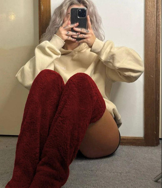 Mandotos cozy winter knee-high fuzzy socks designed for warmth and comfort during cold weather.