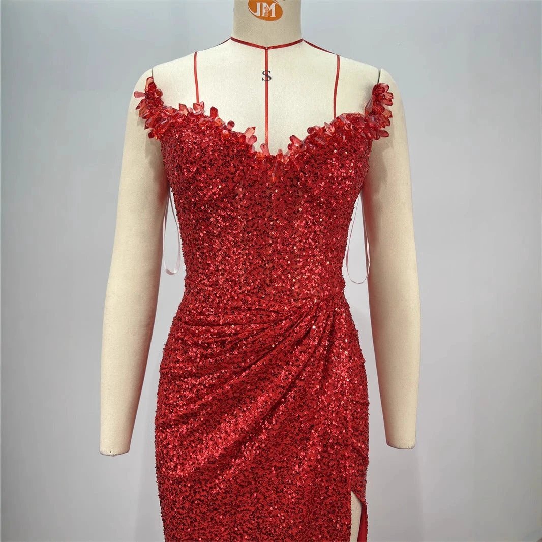 Drop-shaped diamond red paillette tube coat and dress by MANDOTOS, featuring a sexy low-cut, high slit design with sparkling embellishments.
