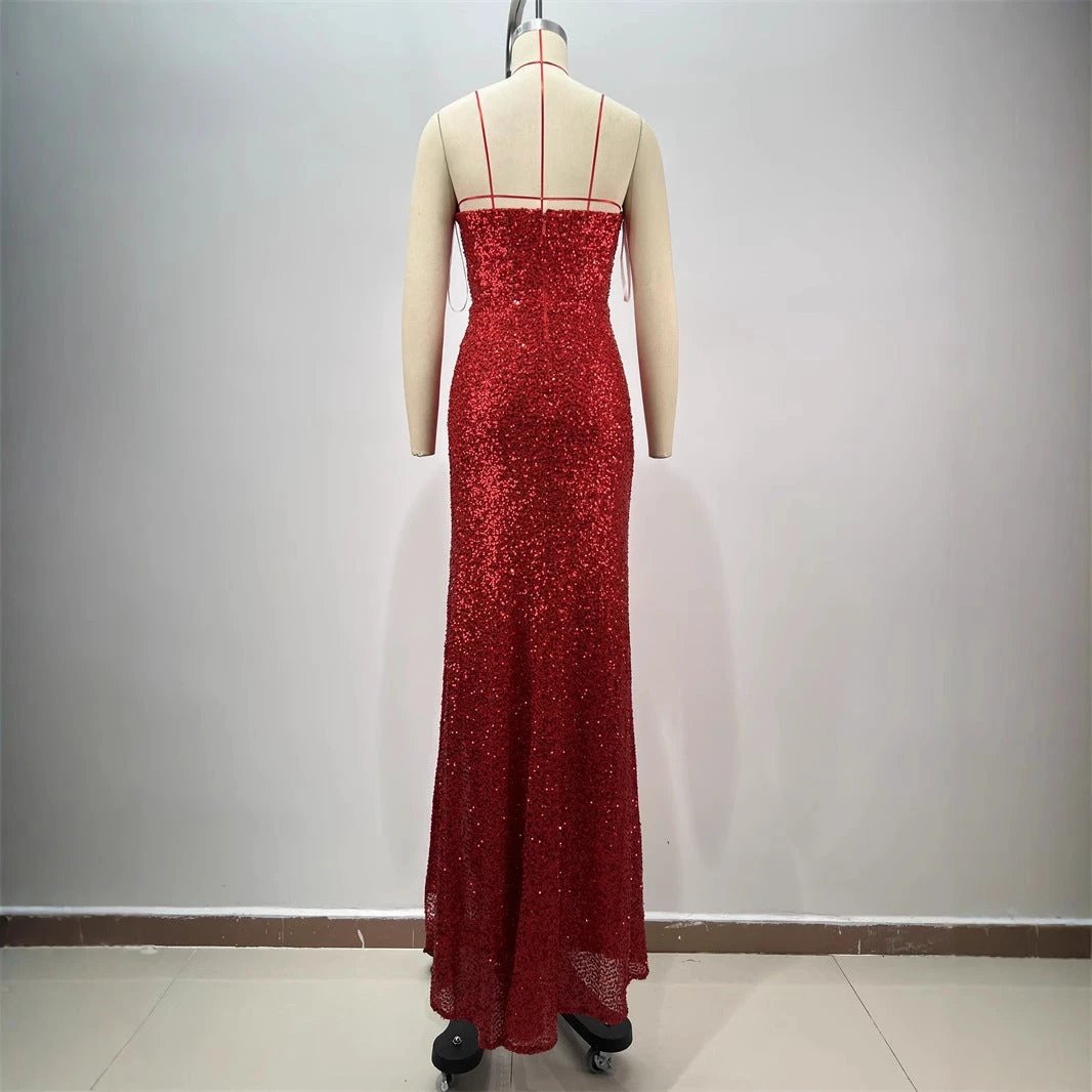 Drop-shaped diamond red paillette tube coat and dress by MANDOTOS, featuring a sexy low-cut, high slit design with shimmering embellishments.