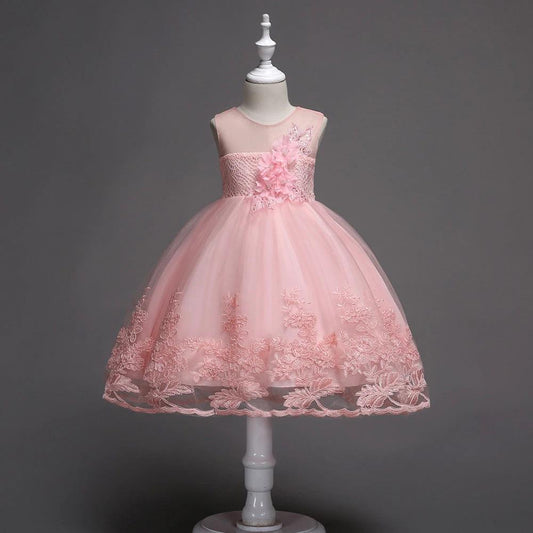 First Communion flower girl dress by Mandotos featuring lace trim, tulle fabric, and intricate bead embroidery.