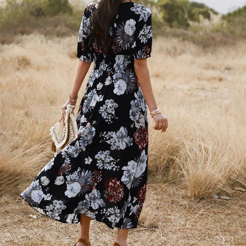 Mandotos floral summer beach dress with V-neck and elastic waist, ideal for women relaxing at the beach or casual outings.