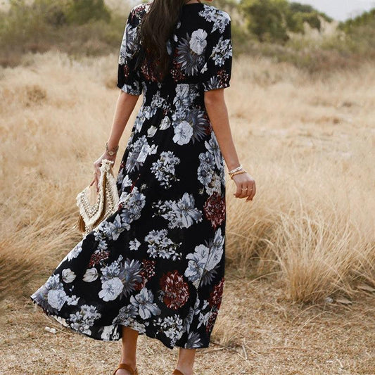 Mandotos floral summer beach dress with V-neck and elastic waist, ideal for women relaxing at the beach or casual outings.