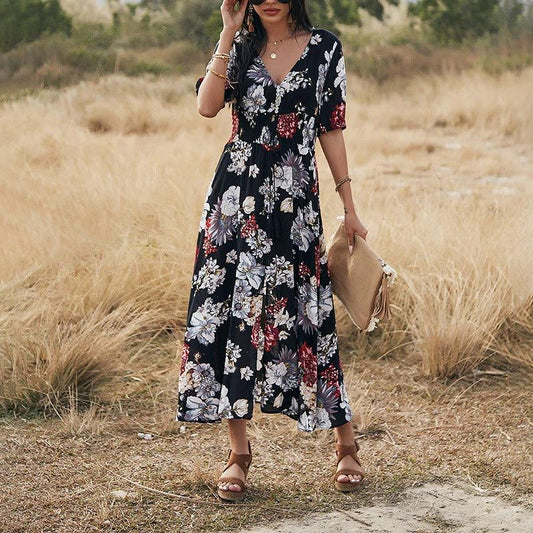 Mandotos floral summer beach dress for women featuring a V-neck and elastic waist, perfect for warm-weather outdoor wear.