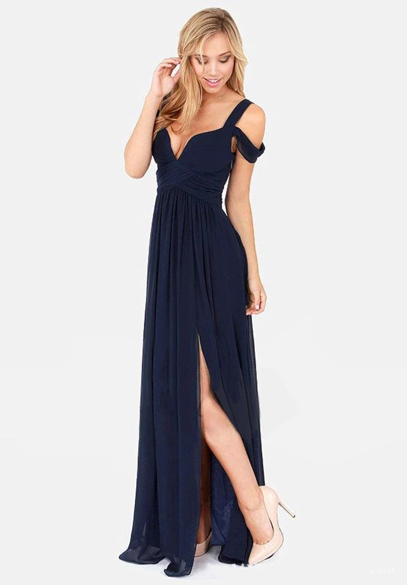 Elegant Greek style pleated long floor-length dress by MANDOTOS, featuring flowing fabric and sophisticated design.