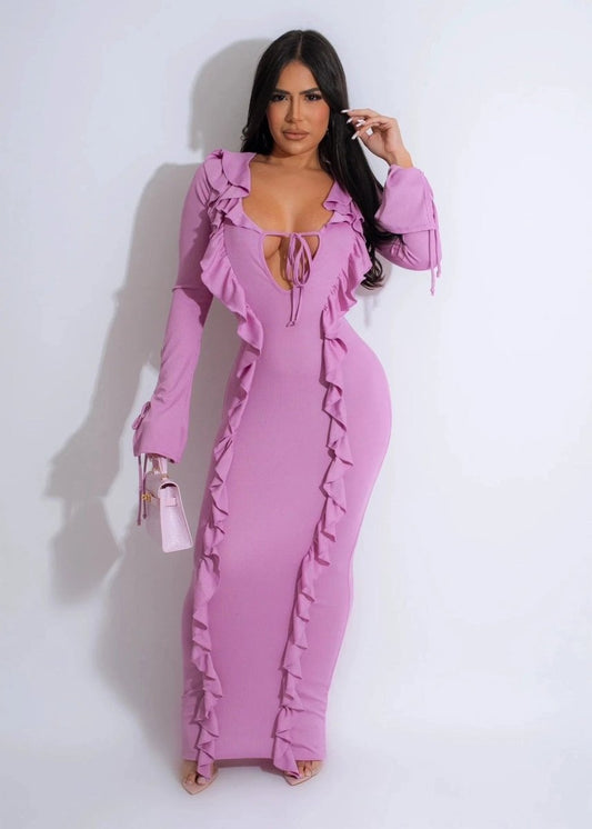Mandotos Pure Color Tied Stringy Selvedge Dress displayed with its vibrant fabric and tied waist design on a model.