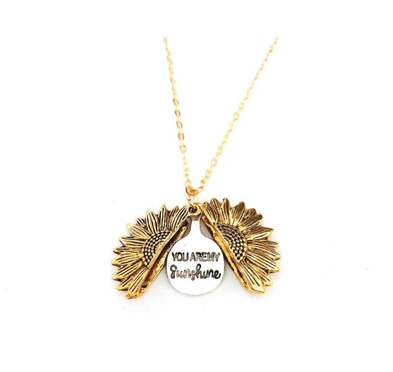 Mandotos sunflower double lettering necklace featuring a gold chain and sunflower charm on a white background