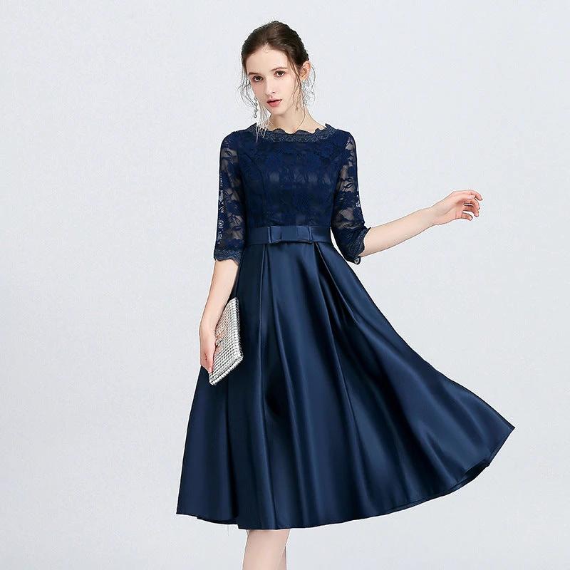 Mandotos casual mid-length evening dress for women, featuring a versatile design with elegant fabric and a flattering fit.