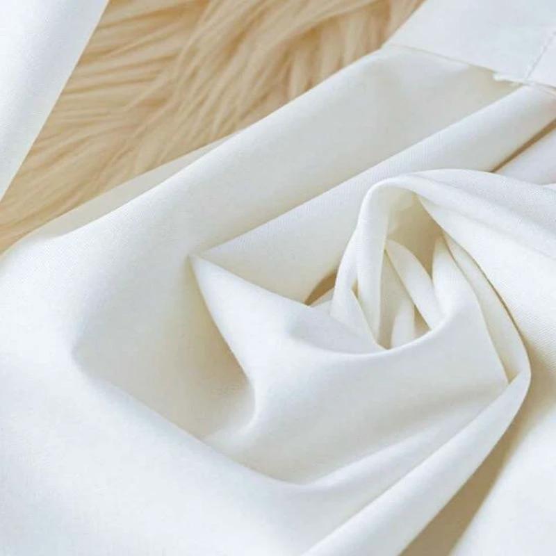 Women's elegant solid color lapel button-down blouse with adjustable metal waist belt, loose fit, suitable for casual and office wear.