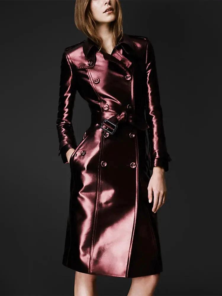 Women's slim fit leather high fashion coat by MANDOTOS, shown hanging with detailed stitching and stylish silhouette.