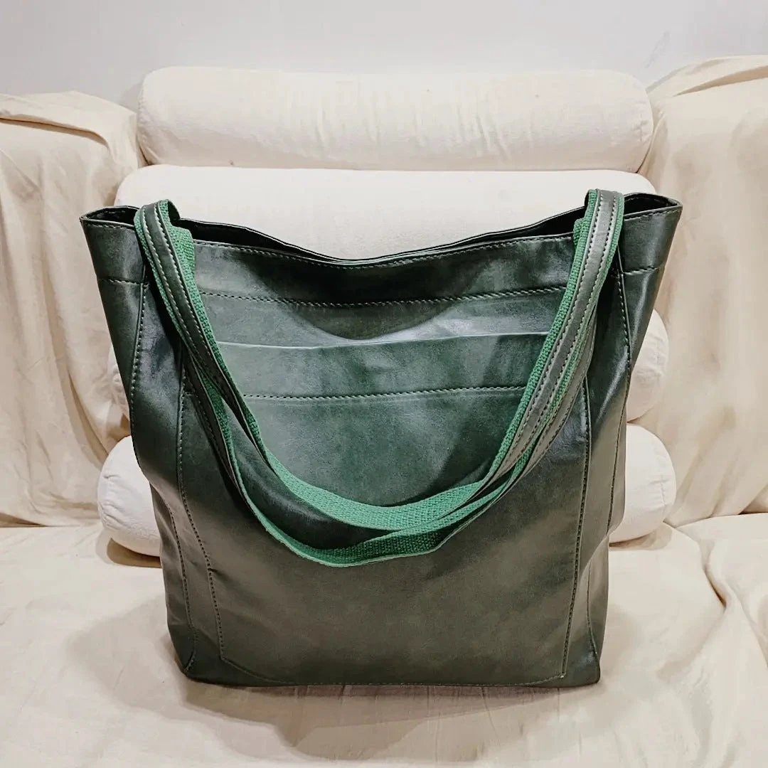 Women's soft leather vintage shoulder bag by MANDOTOS with a pocket, portable and stylish for everyday use.