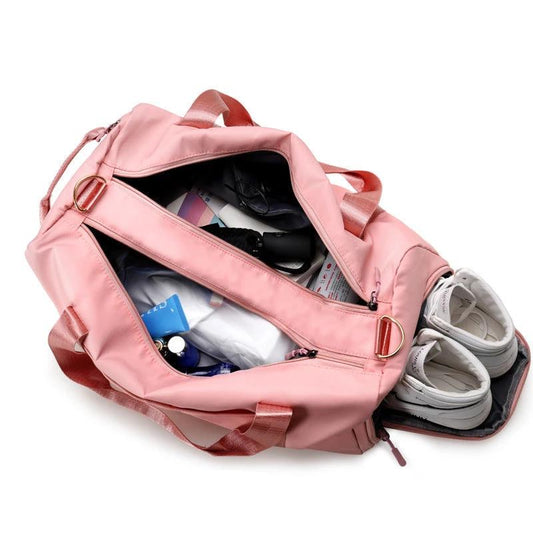 Mandotos waterproof fitness sports travel duffel bag with shoulder straps, ideal for gym, swim, and weekend trips for women and men.