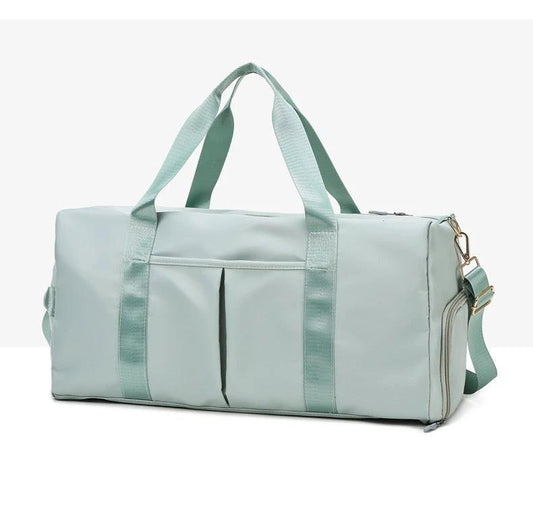 Mandotos waterproof fitness sports travel duffel bag with shoulder strap, ideal for gym, swim, and weekend trips for women and men.