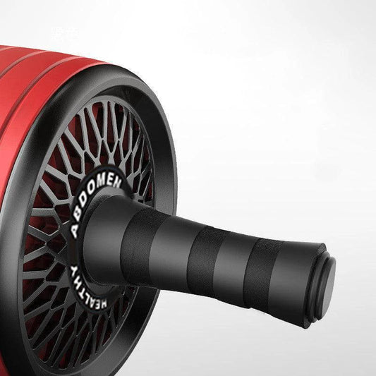 Mandotos ab roller wheel with knee pads for core training, showing the roller and padded knee support on a workout surface.