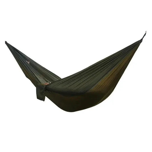 Mandotos Adventure Hammock Pack with lightweight hammock, straps, and gear for outdoor camping and relaxing in nature.