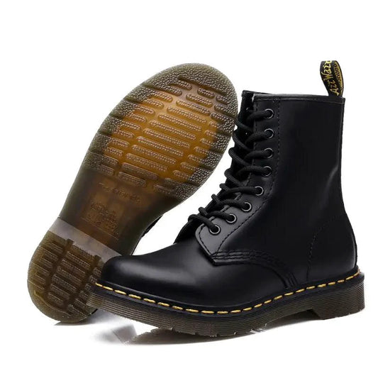 All-season leather boots by MANDOTOS featuring stylish design, durable leather material, and versatile footwear for everyday wear.