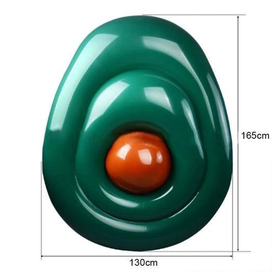 Mandotos avocado-shaped inflatable pool filled with water, perfect for summer relaxation and outdoor fun.