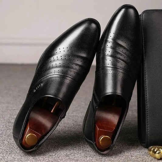 Mandotos men's casual pointed toe leather shoes showing sleek design and smooth black leather finish.
