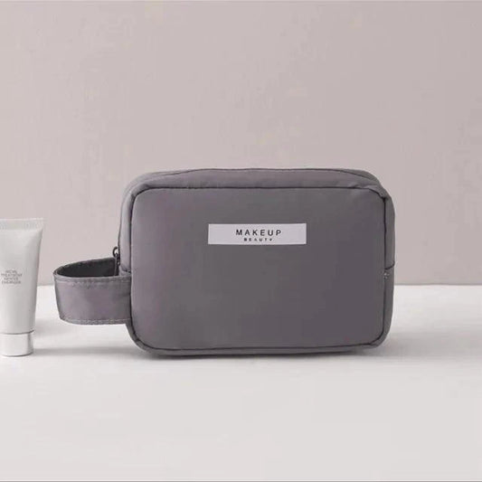 Mandotos Chic Beauty Bag Organizer with multiple compartments for cosmetics and toiletries, compact and stylish for travel.