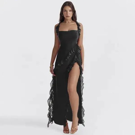 Elegant black maxi dress by MANDOTOS featuring a flowing silhouette and stylish design for sophisticated occasions.