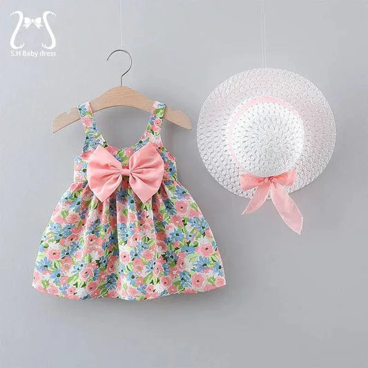Chic toddler girl summer duo dresses by MANDOTOS featuring colorful, lightweight fabrics and playful designs for warm weather.