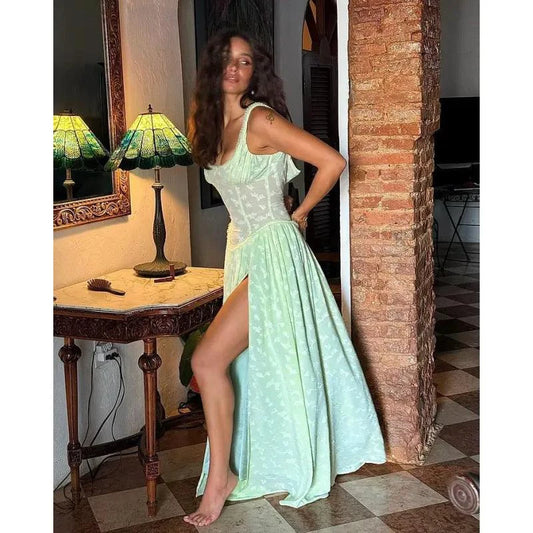 Mandotos chic V-neck lace sundress displayed on a hanger, featuring delicate lace fabric and a flowing summer style.