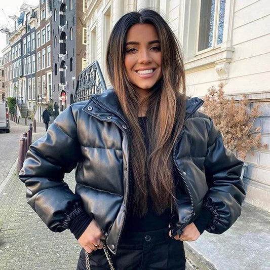 Mandotos chic winter PU leather jacket displayed on a hanger, featuring a stylish design and smooth black leather finish.