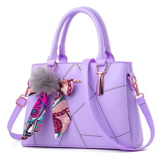 Chic women's crossbody tote bag by MANDOTOS with sleek design, adjustable strap, and spacious interior for everyday use.