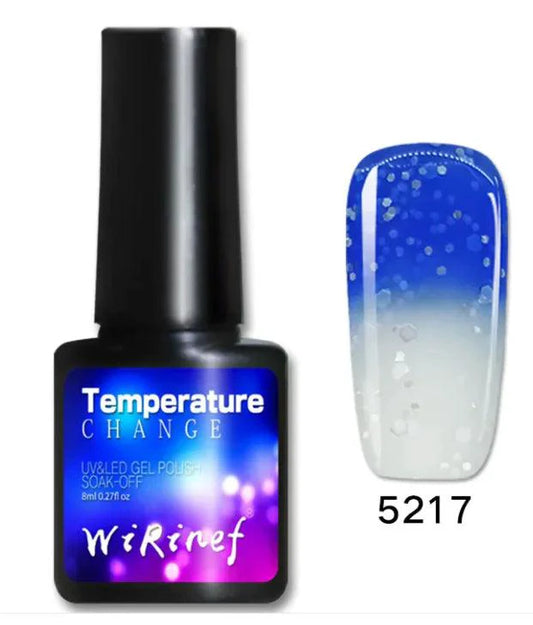 Mandotos Chromatic Nail Adhesive bottle with applicator brush, clear nail glue for strong, long-lasting manicures.