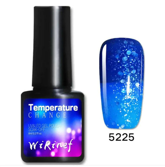 Mandotos Chromatic Nail Adhesive bottle with applicator, clear formula for strong, long-lasting nail bond.