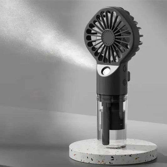 Mandotos Compact Hydrating Mist Fan showing the portable fan with mist spray feature and ergonomic handle for refreshing comfort.