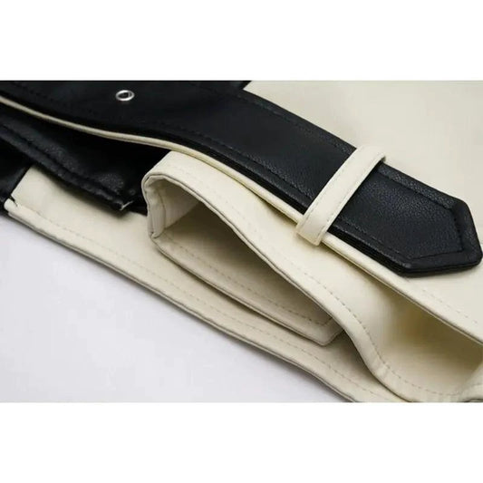 Mandotos contrast vegan leather jacket with black and white color blocks, featuring a sleek, modern design and stylish lapel collar.