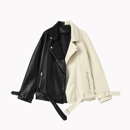 Mandotos contrast vegan leather jacket with stylish design, featuring black and white panels, shown on a model.
