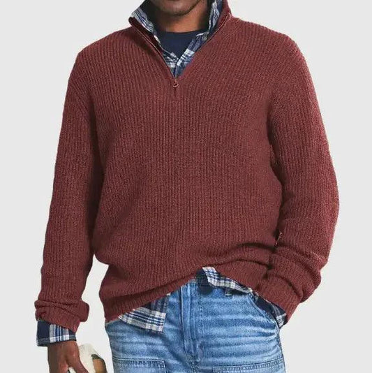 Mandotos Cozy Zip-Up Knit Sweater displayed on a hanger, featuring a soft, textured fabric and a front zipper detail.