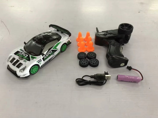 Mandotos 4WD 2.4G RC Drift Car GTR model AE86 remote control racing toy for children, suitable for Christmas gifts.